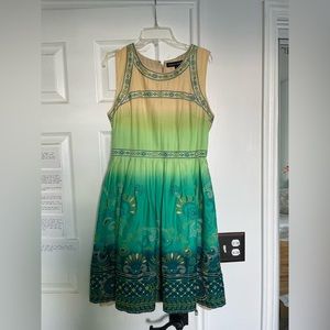Vintage sleeveless dress with embroidered details, size small